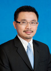Dr. Loc Q. Huynh, D.M.D., AEGD, FICOI